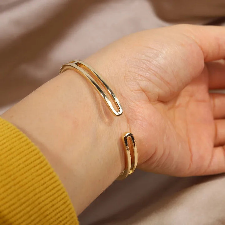 Strahlendes Knoten-Bliss-Goldarmband