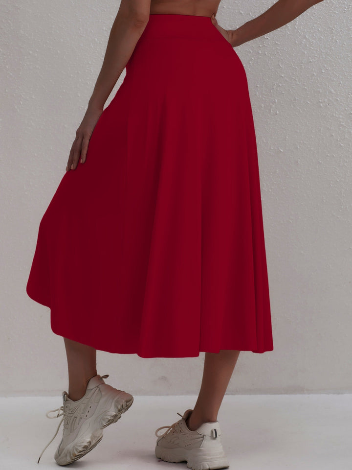 Sportos szoknya magas derekú és aszimmetrikus szabással - Alexia