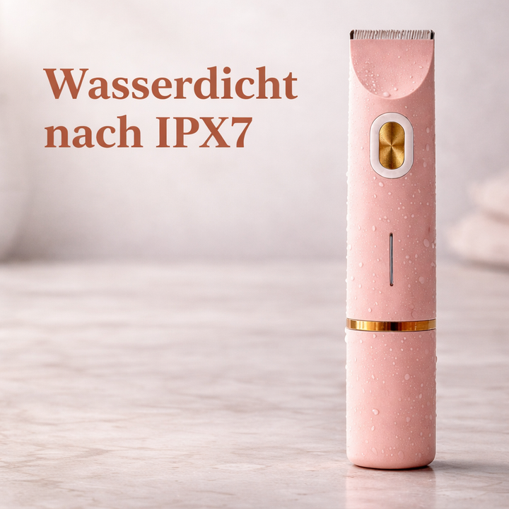 Vízcseppekkel borított rózsaszín trimmer áll márvány felületen.