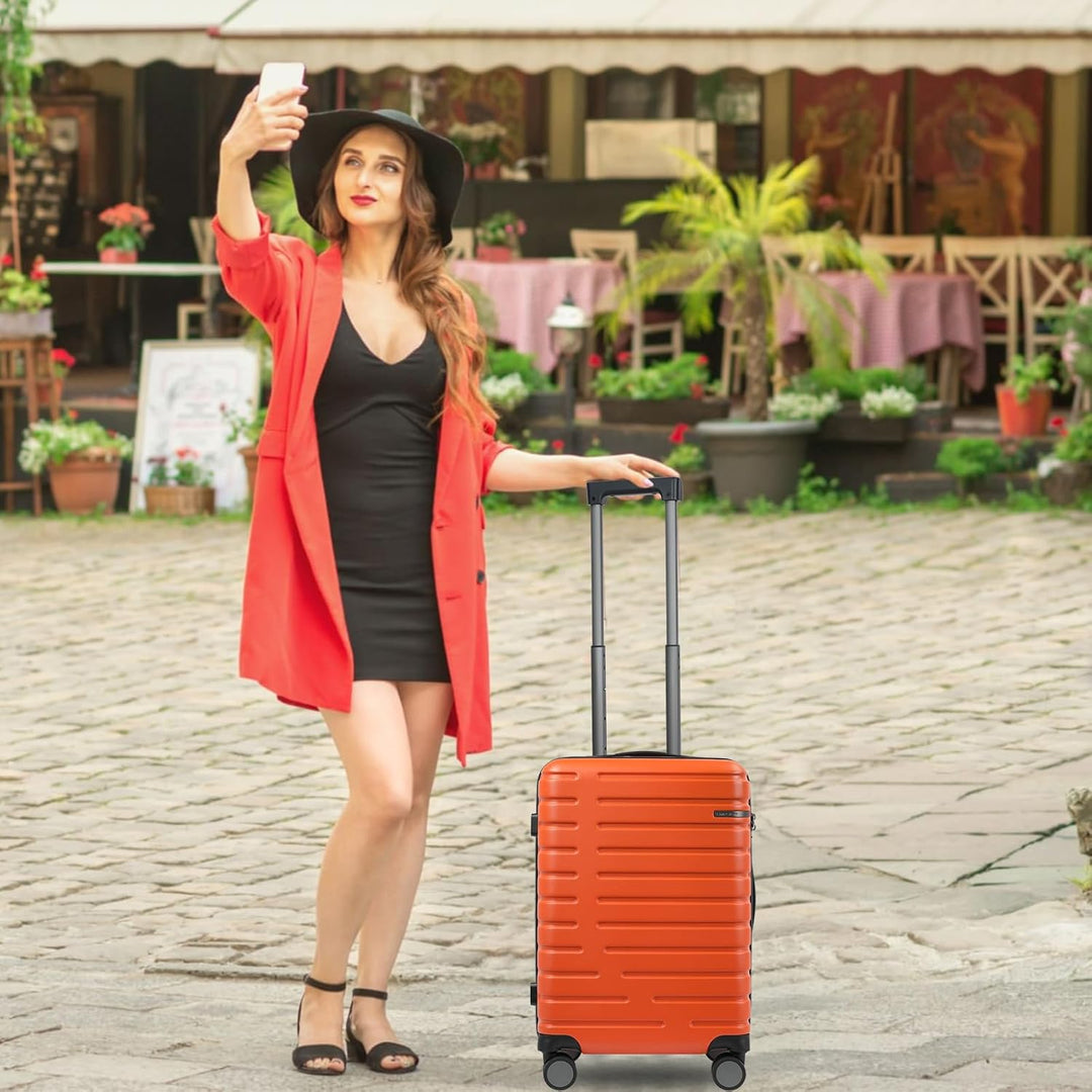 Bővíthető kemény héjú kézipoggyász forgó kerekekkel és TSA zárjal