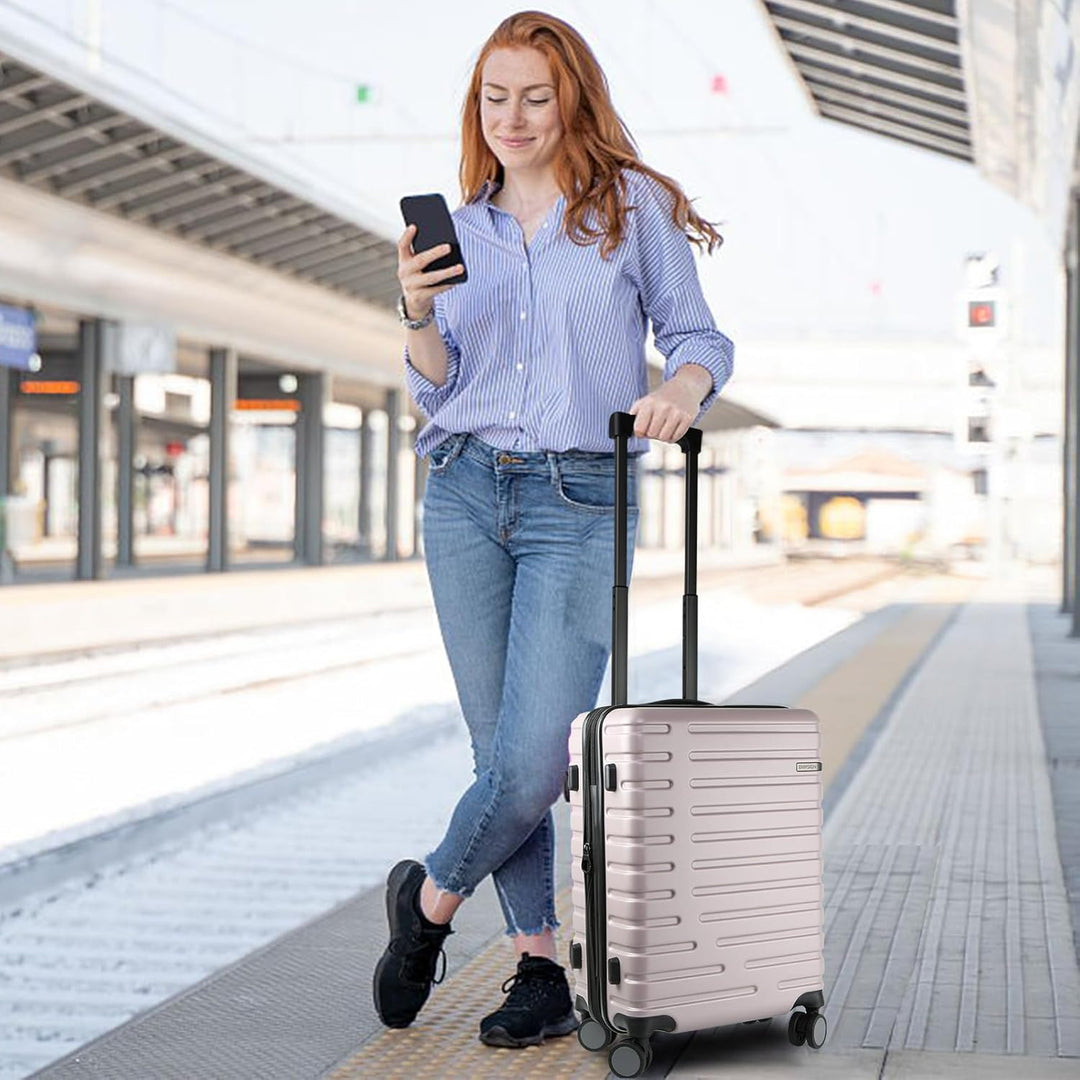 Bővíthető kemény héjú kézipoggyász forgó kerekekkel és TSA zárjal