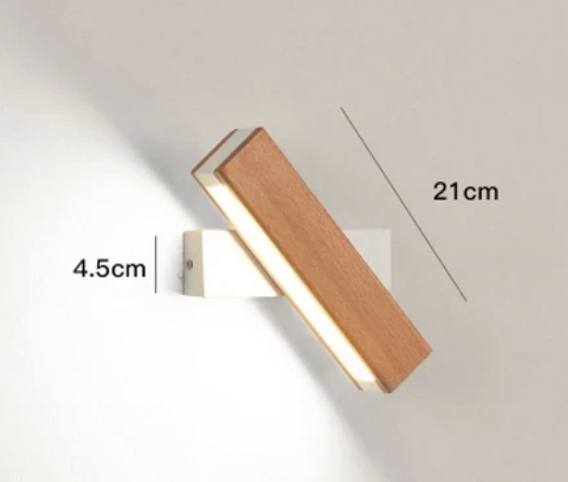 Bézs és fehér japán stílusú LED fali lámpa 21 cm-es változata fehér tartón, elforgatva és világítva.