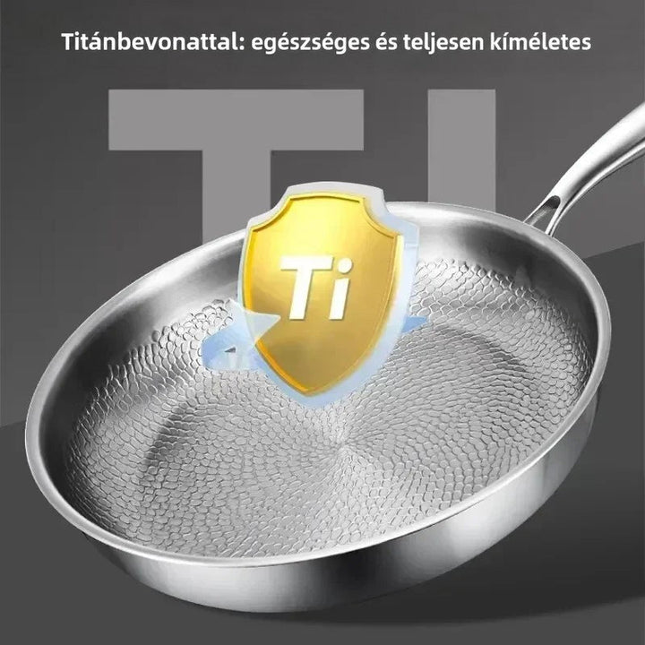 A serpenyő belseje sötét háttér előtt, rajta sárga pajzs ikon, amely a titánréteget jelképezi. 6