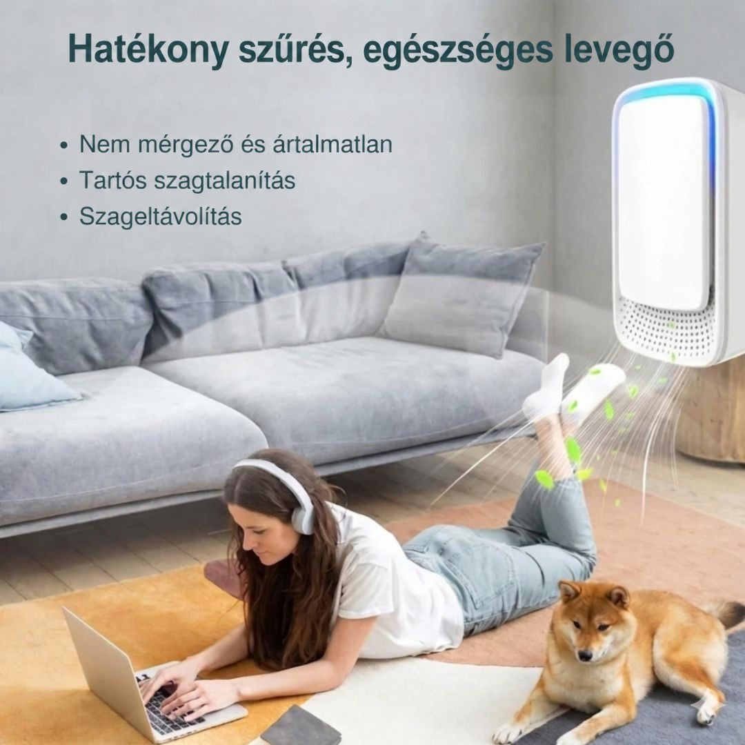 Nő fekszik a szőnyegen laptoppal és fejhallgatóval, mellette kutya, a falon ionizátor friss levegőt áraszt 7