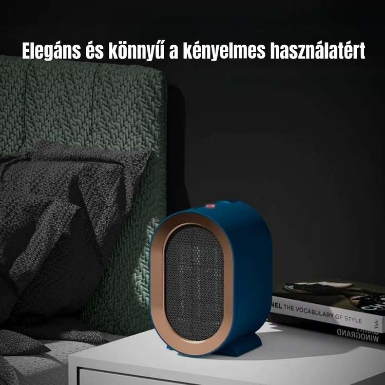 Kék kerámiafűtő egy fehér éjjeliszekrényen sötét hálószobában, piros működésjelző fénnyel 2