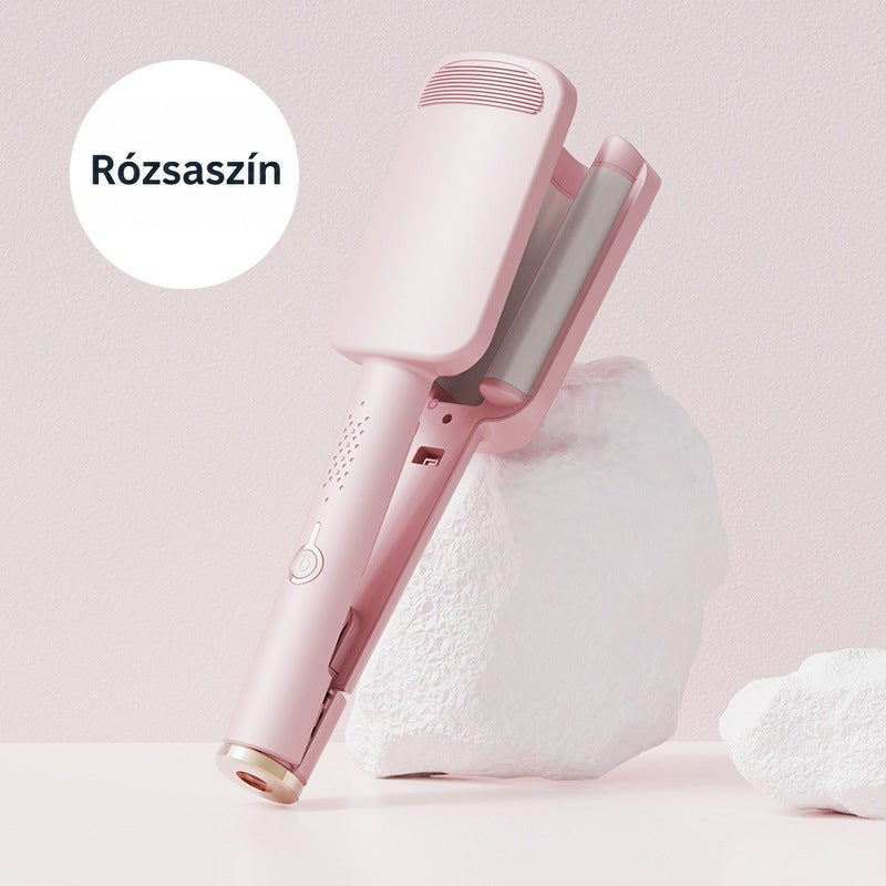 Rózsaszín hullámosító vasaló fehér sziklának támasztva, rózsaszín háttér előtt 3