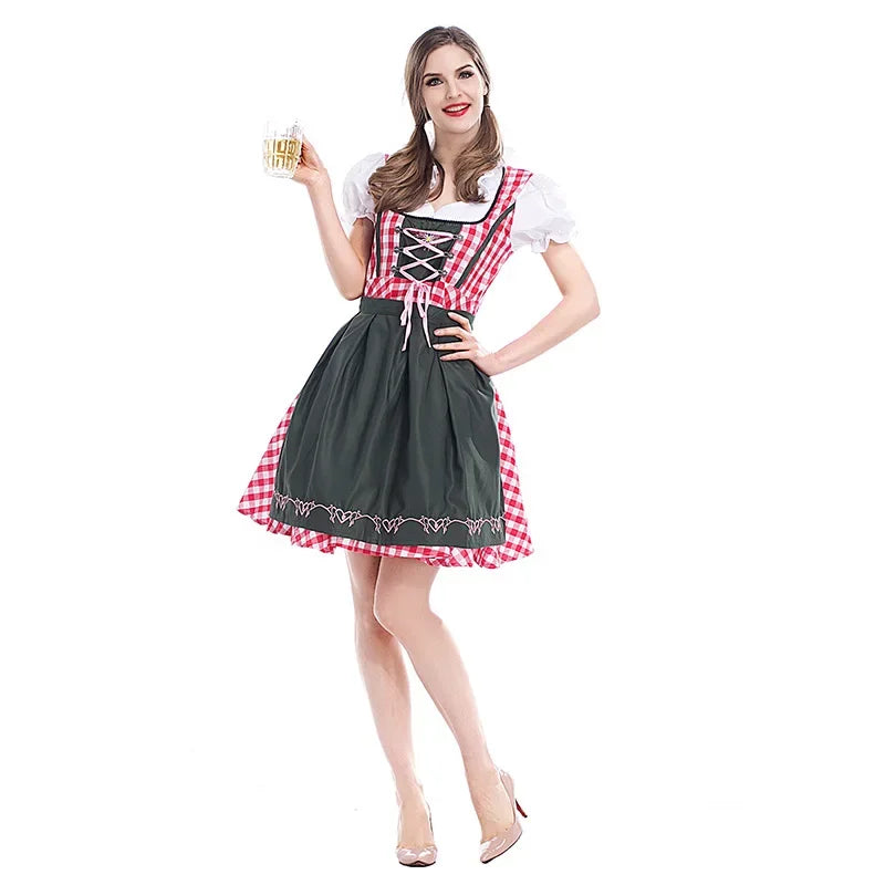 Piros-fehér kockás női dirndl ruha sötétzöld hímzett köténnyel, elölnézetben.