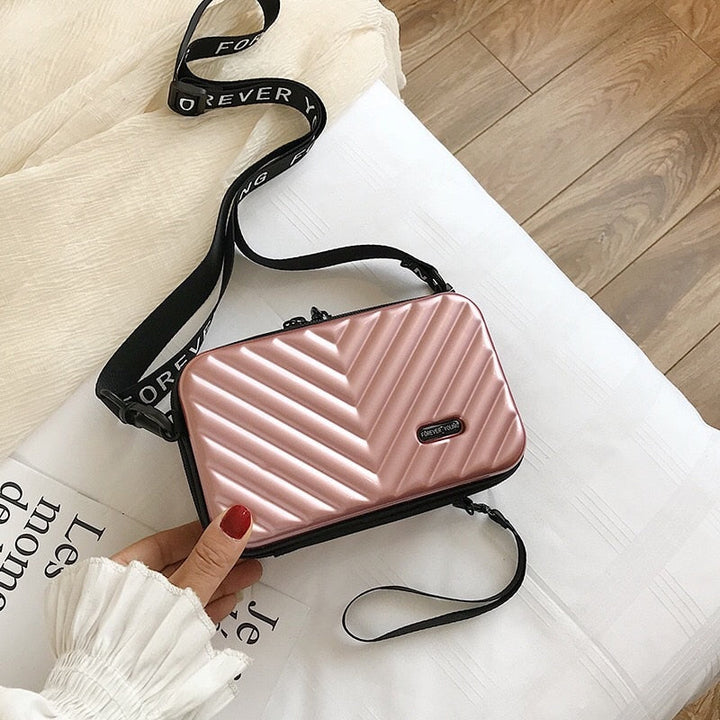 Kompakt kemény héjú utazótáska